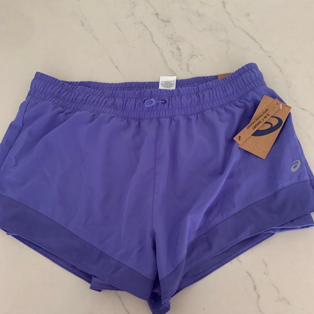 Dark purple ASICS athletic shorts